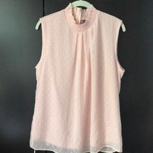 Sleeveless high neck blouse